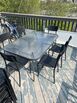 Dining table and 6 hard plastic chairs